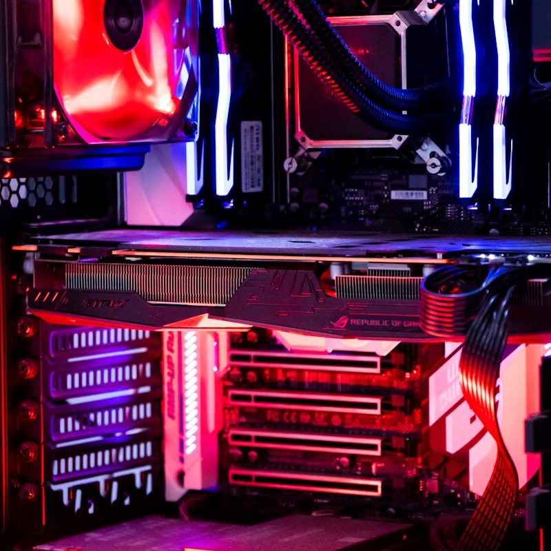 PC Hardware Components PC components like RAM, SSD, and graphics card arranged on the desk